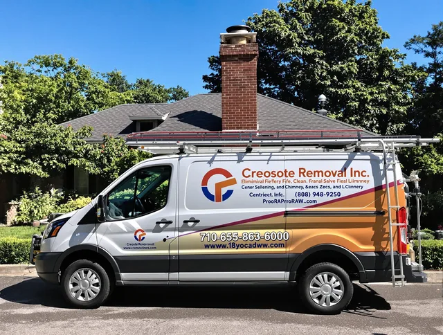 Pembroke Chimney Sweep technician removing creosote safely in Pembroke, MA