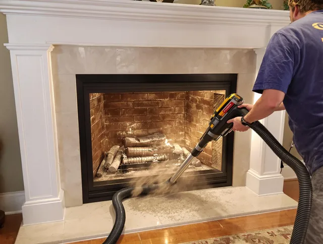 Fireplace cleaning performed by Pembroke Chimney Sweep in Pembroke, MA