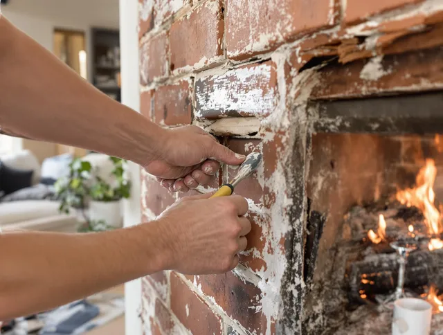Routine fireplace repair by Pembroke Chimney Sweep in Pembroke, MA